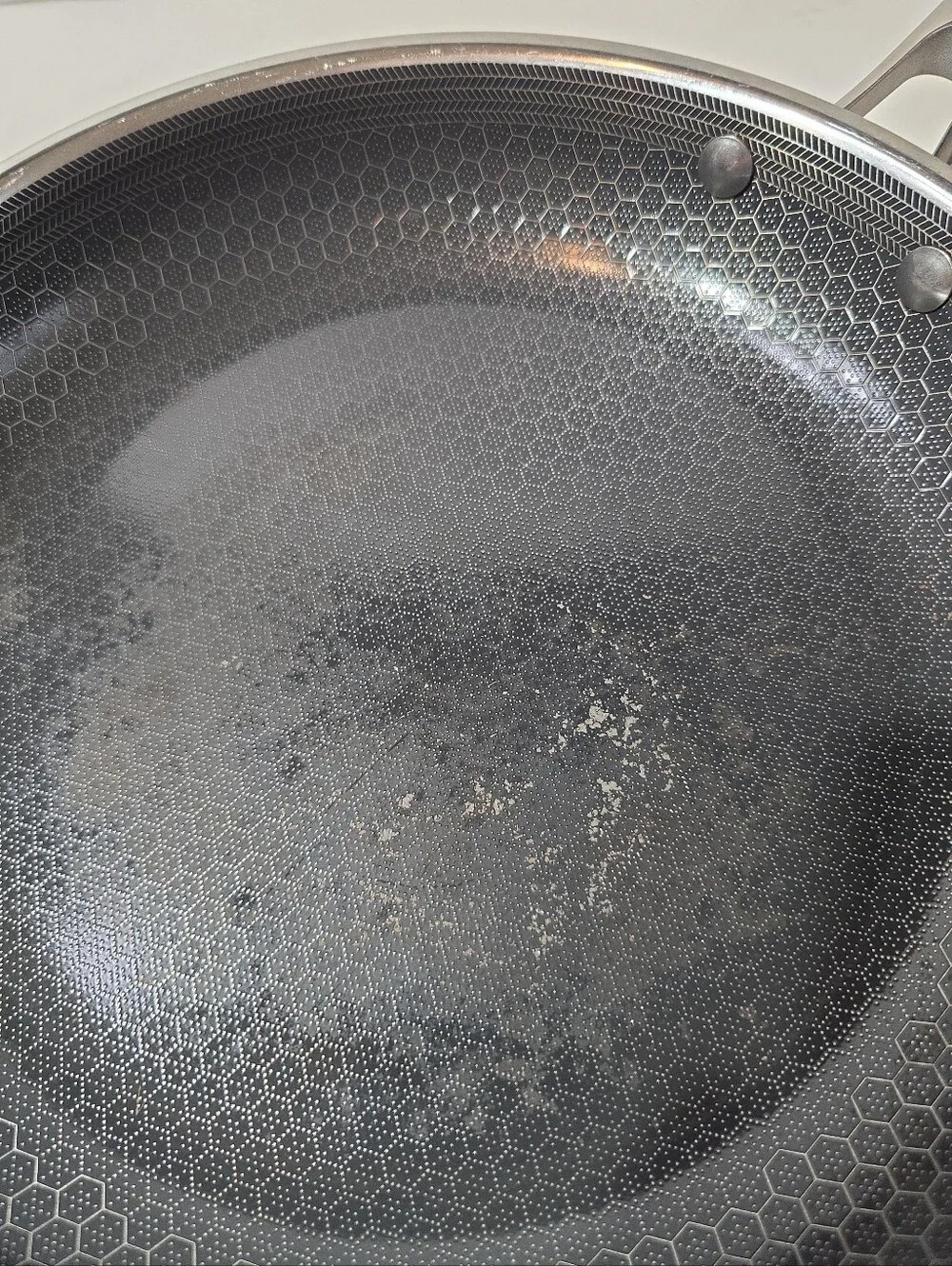 Hexclad Black 10 Inch Frying Pan with Stainless Handle Some Baked On Marks
